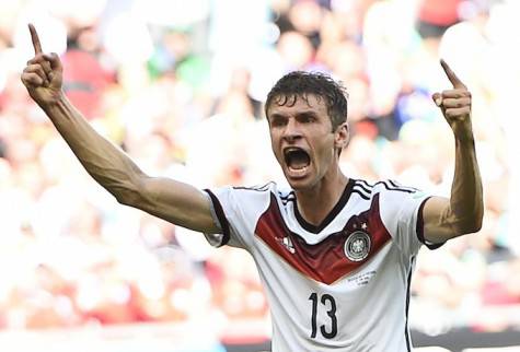 Germany's Mueller celebrates scoring his team's third goal, his second goal for the match, against Portugal during their 2014 World Cup Group G soccer match at the Fonte Nova arena in Salvador