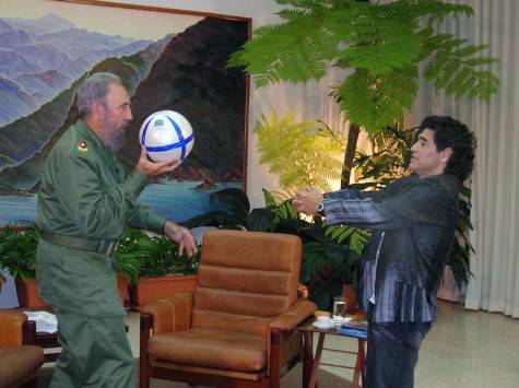 In this photo made available by Argentina's Canal 13, Cuban President Fidel Castro, left, plays with a ball with former Argentine soccer star Diego Maradona Wednesday, Oct. 26, 2005 in Havana, Cuba. (AP Photo/Canal 13, HO)