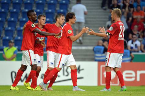 BIELEFELD, GERMANY - AUGUST 10: (L-R) Salomon Kalou, Vladimr Darida, Peter Pekarik, Nico Schulz and Fabian Lustenberger of Hertha BSC celebrate after scoring the 1:0 durch Salomon Kalou during the match between Arminia Bielefeld and Hertha BSC on August 10, 2015 in Bielefeld, Germany. (Photo by Marco Leipold/City-Press via Getty Images)