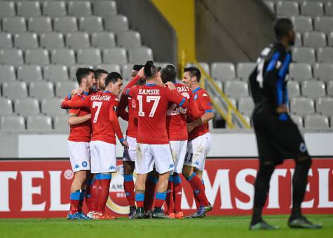 Napoli's teammates celebrate after scoring during the UEFA Europa League Group D football match between Club Brugge and SSC Napoli played behind closed doors at the Jan Breydel stadium in Bruges on November 26, 2015.  AFP PHOTO / JOHN THYS / AFP / JOHN THYS        (Photo credit should read JOHN THYS/AFP/Getty Images)