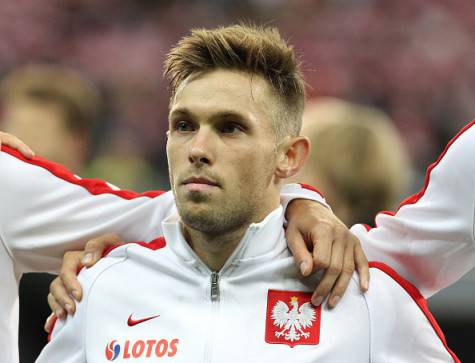 Poland's midfielder Maciej Rybus is pictured prior to the Euro 2016 qualifying football match between Germany and Poland in Frankfurt am Main, central Germany, on September 4, 2015.  AFP PHOTO / DANIEL ROLAND        (Photo credit should read DANIEL ROLAND/AFP/Getty Images)