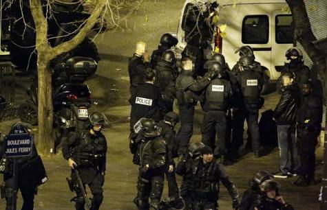 Police secure the area close to the Cafe Bonne Biere, Jules Ferry Square, in Paris, on November 13, 2015. A number of people were killed and others injured in a series of gun attacks across Paris, as well as explosions outside the national stadium where France was hosting Germany.  AFP PHOTO / KENZO TRIBOUILLARD        (Photo credit should read KENZO TRIBOUILLARD/AFP/Getty Images)