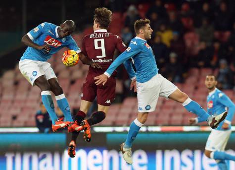 NAPLES, ITALY - JANUARY 06: Kalidou Koulibaly (L) and David Lopez (R) of Napoli compete for the ball in air with Andrea Belotti of Torino during the Serie A match between SSC Napoli and Torino FC at Stadio San Paolo on January 6, 2016 in Naples, Italy. (Photo by Maurizio Lagana/Getty Images)