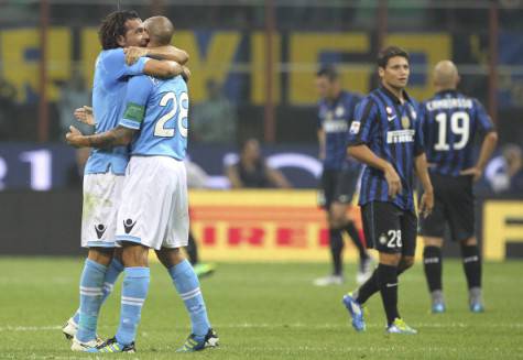 MILAN, ITALY - OCTOBER 01:  Paolo Cannavaro (R) of SSC Napoli celebrates  with team-mates Salvatore Aronica (L) during the Serie A match between FC Internazionale Milano and SSC Napoli at Stadio Giuseppe Meazza on October 1, 2011 in Milan, Italy.  (Photo by Marco Luzzani/Getty Images)